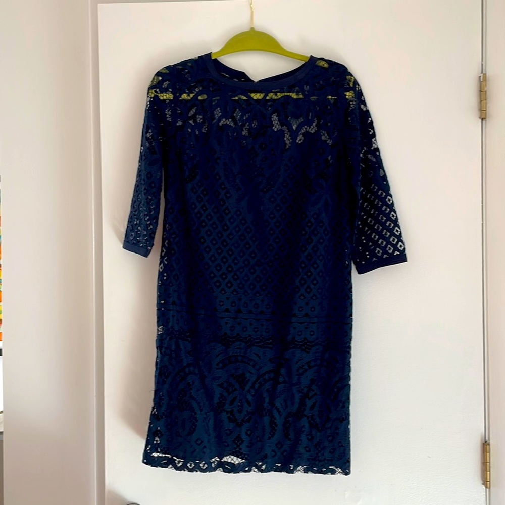 Navy blue straight cut dress. Zips in back size 2.